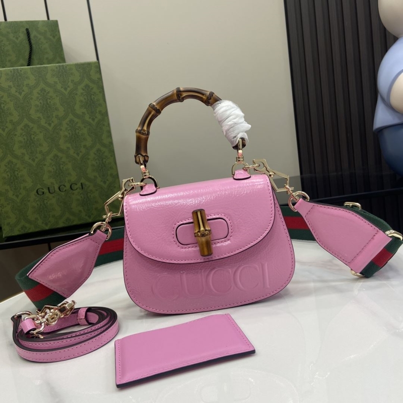 G*u*i top handle bags